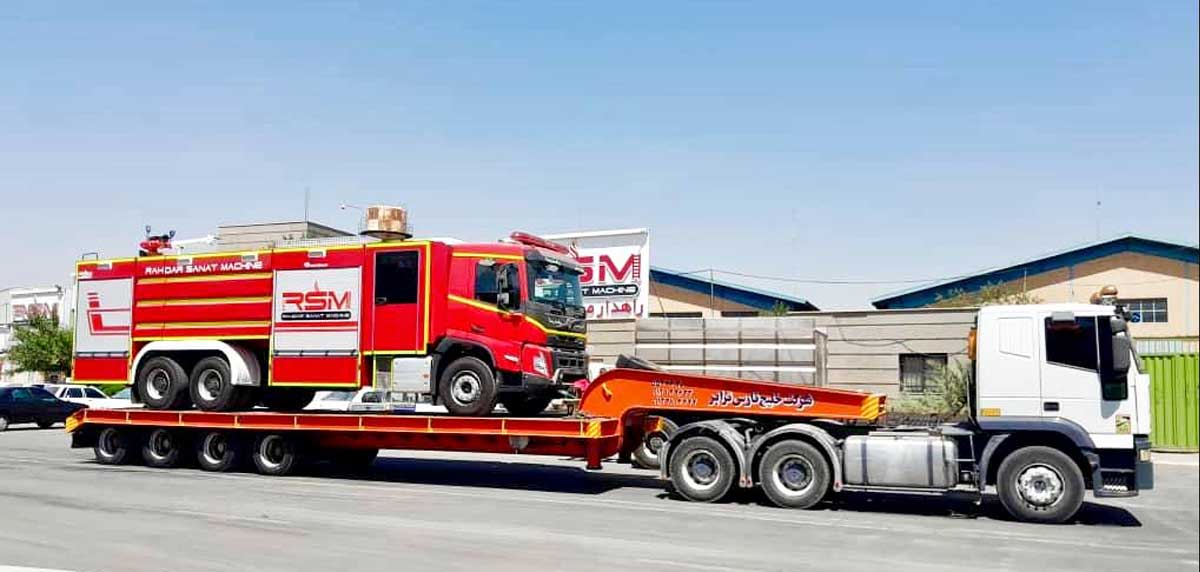 حمل کامیون آتش نشانی به وسیله کامیون و تریلر کمرشکن
