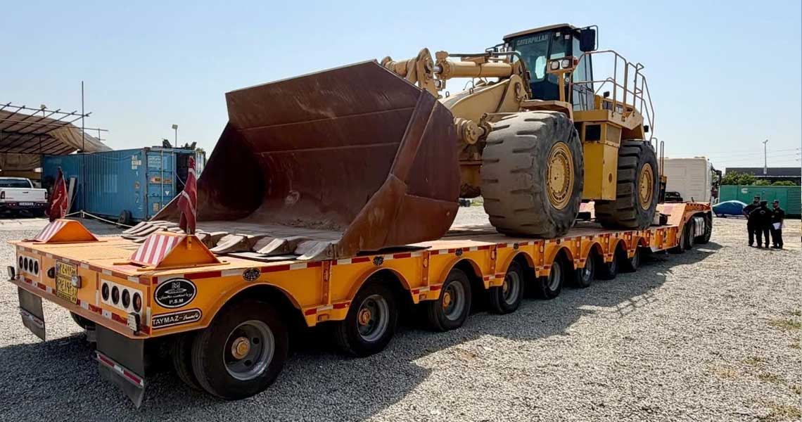 حمل لودر ۹۸۸ کاترپیلار؛ راهنمای حمل ایمن و تخصصی