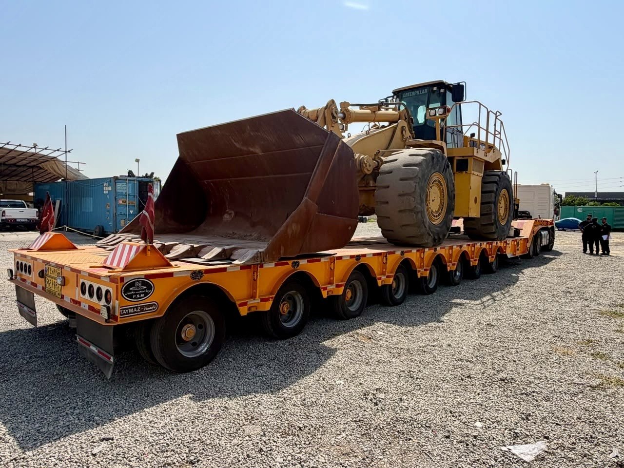 photo_2026-08-05 حمل لودر ۹۸۸ کاترپیلار؛ راهنمای حمل ایمن و تخصصی